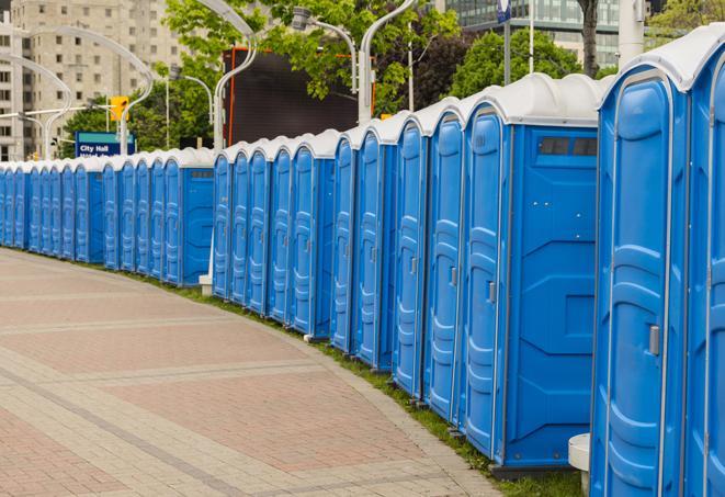 portable restrooms with sink and hand sanitizer stations, available at a festival in Boynton Beach FL